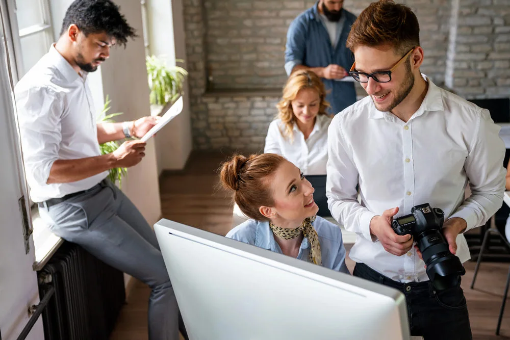 creative team for onlyfans marketing during work